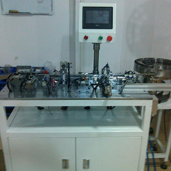 A female 90 degree, 180 degree shared assembly machine